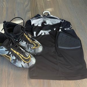 Nike football cleats size 5.5 and adidas football chest protector